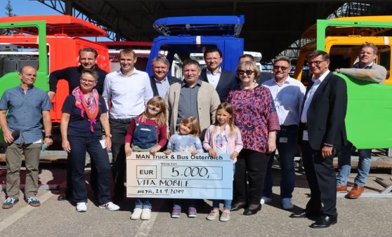 Scheck-Übergabe beim MAN-Familientag