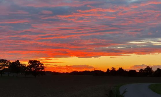 Wolkenspiel beim Sonnenuntergang